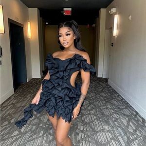 Black ruffled backless dress. True to size.